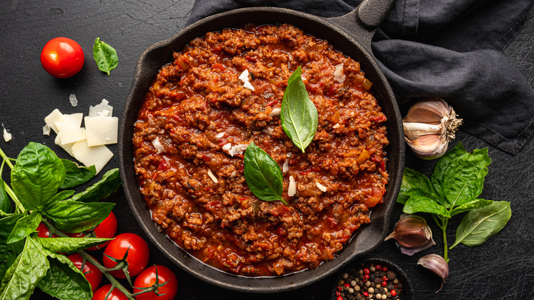 Rich bolognese sauce in cast iron pan