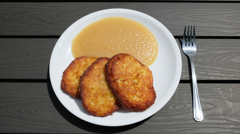 potato pancakes served with applesauce