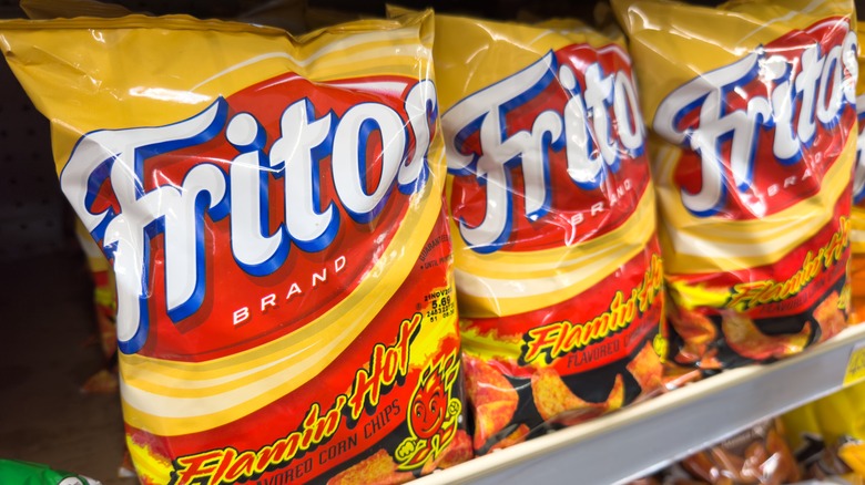 Bags of Flamin' Hot Fritos at the grocery store