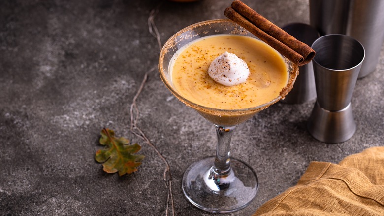 Pumpkin martini cocktail with whipped cream