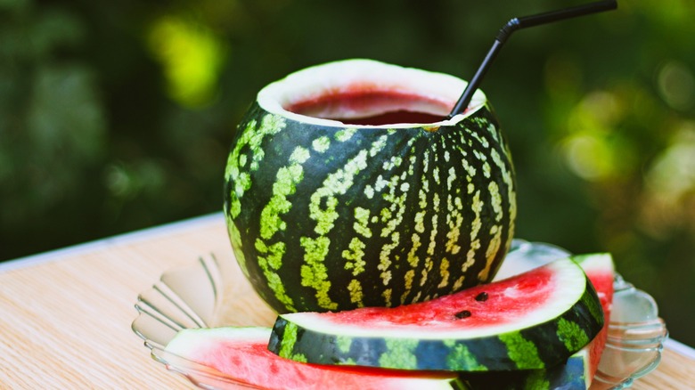 Watermelon rind holding drink