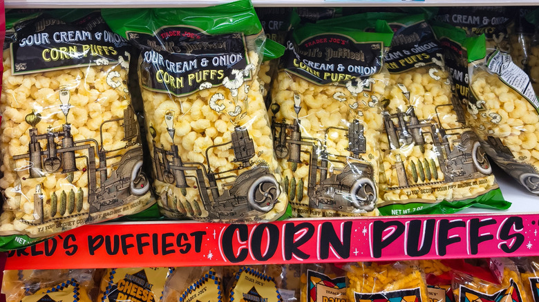 Trader Joe's corn puffs sit on a store shelf