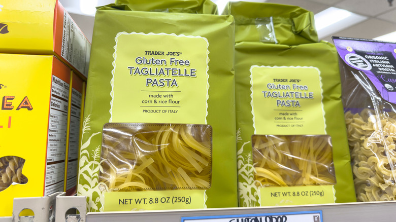 Trader Joe's gluten-free tagliatelle pasta sits on a store shelf