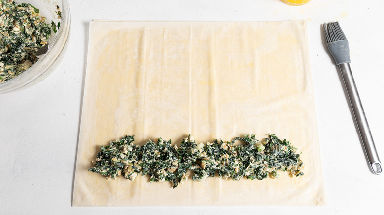 spinach filling on phyllo sheet