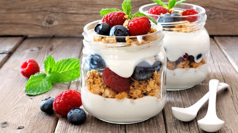 Yogurt, granola and berries in a jar