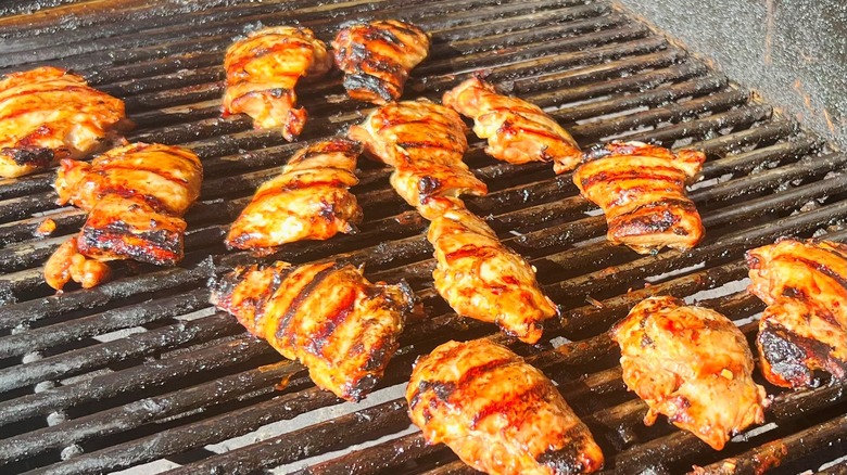 chicken thighs on grill grates