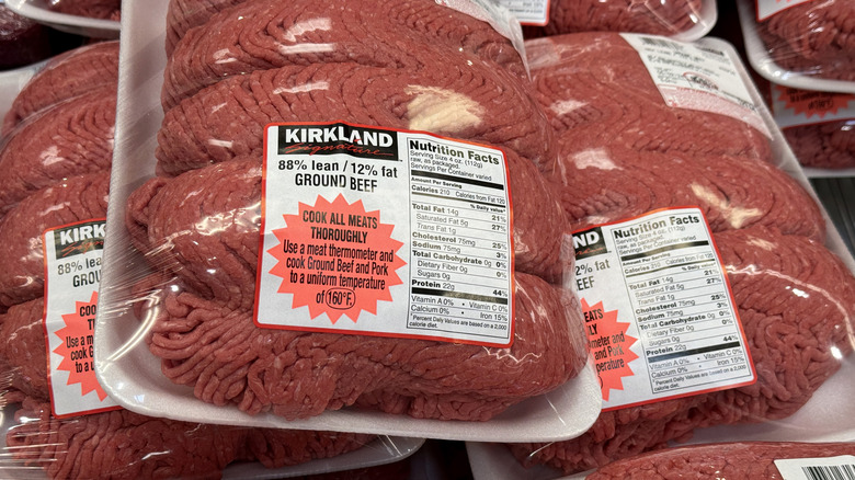 Packages of Costco ground beef sit on top of each other