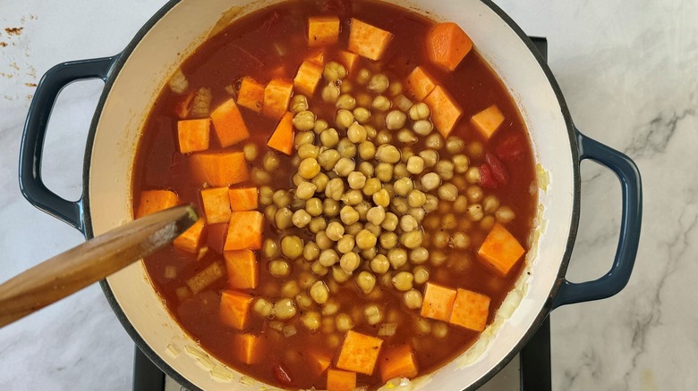 chickpeas sweet potatoes tomato in pot