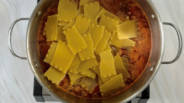 broken lasagna noodles in pot