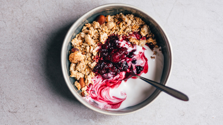 bowl of kefir with granola and blueberries