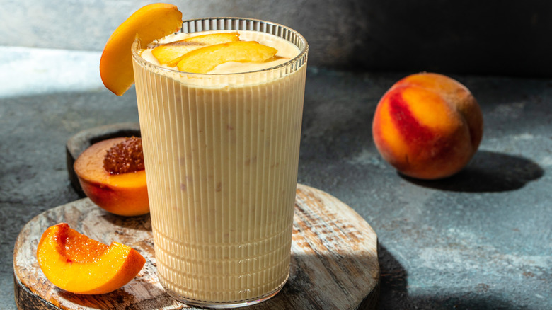 A glass of peach smoothie