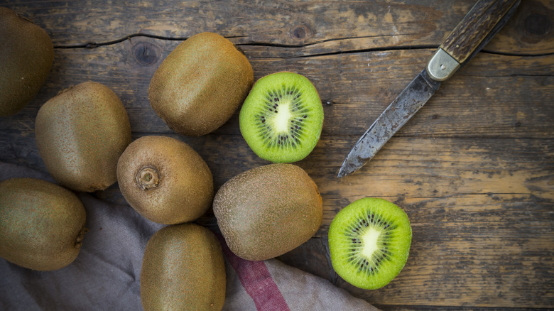 Kiwis on a wooden board