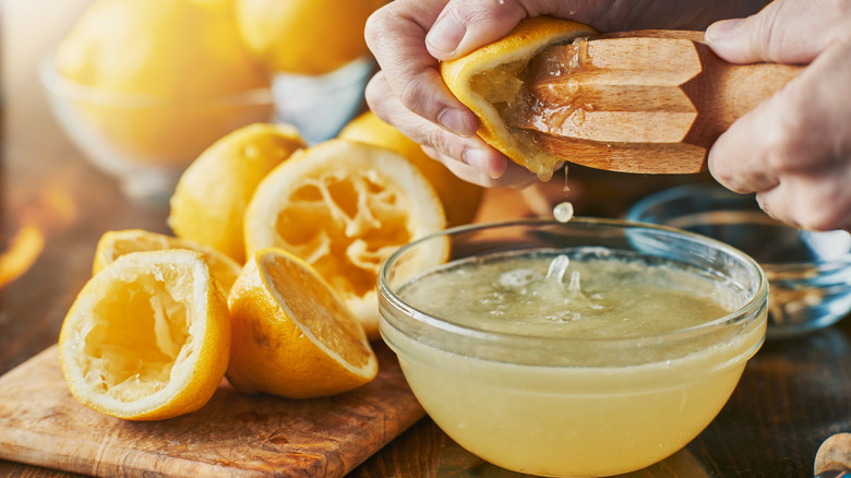 Juicing lemons with citrus reamer