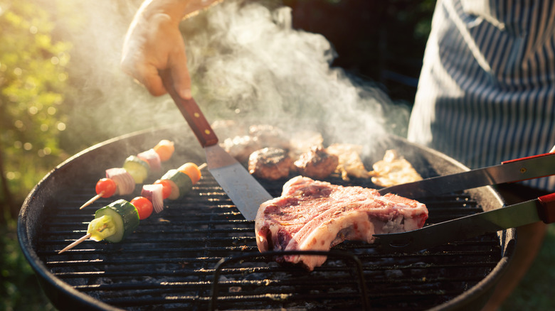 Person barbecuing food