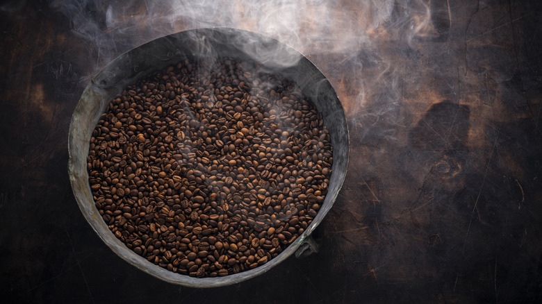 Coffee beans roasting in pan