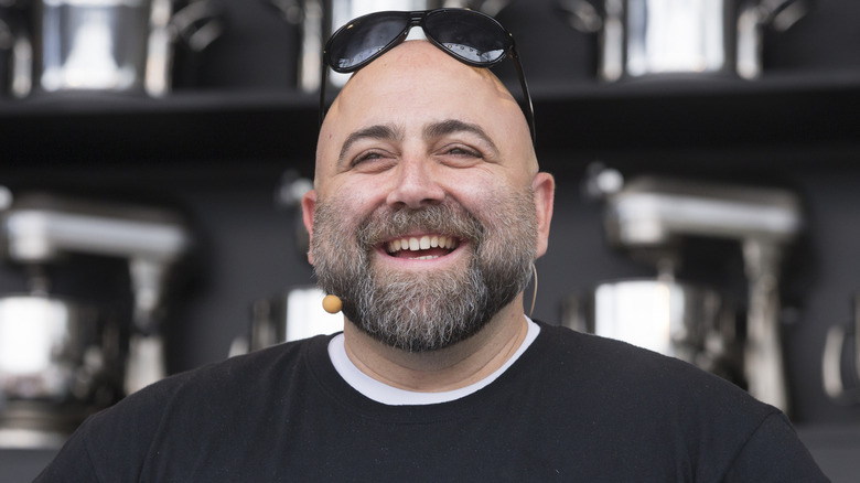 This closeup shows Food Network star Duff Goldman smiling.