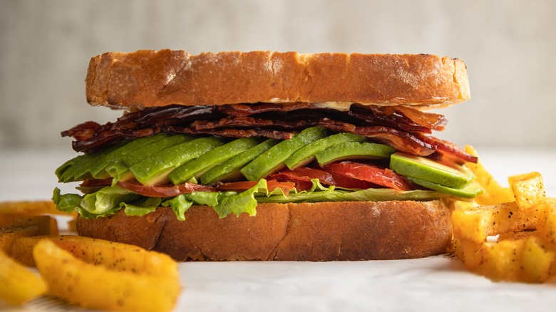 Bacon, lettuce, tomato, and avocado sandwich