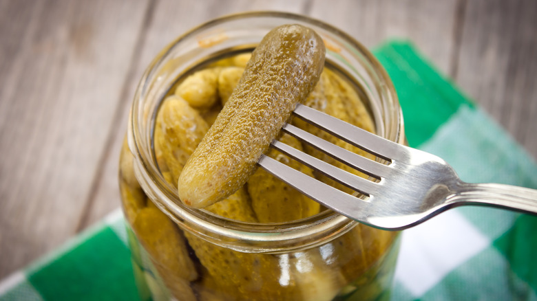 fork taking pickle out of jar