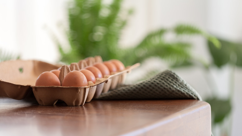 Carton of eggs on a table