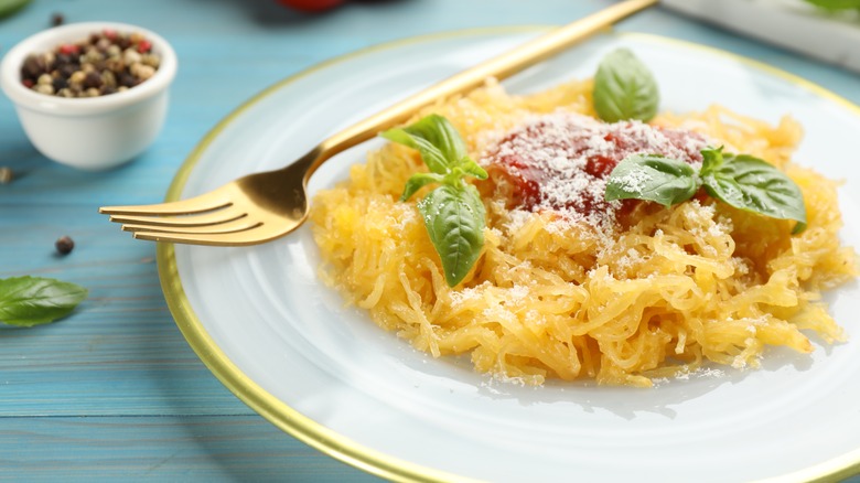 Spaghetti squash noodles with pasta sauce, basil, parmesan 