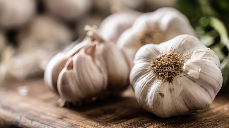 garlic on wooden cutting board