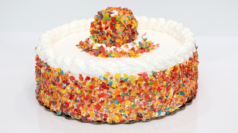 Ice cream cake coated in Fruity Pebbles