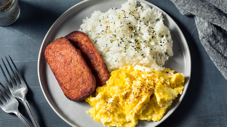 fried spam served with rice and soft scrambled eggs