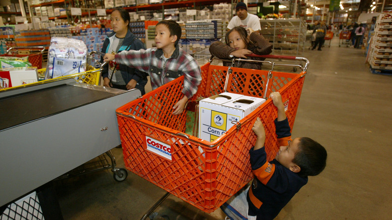 family checking out at Costco