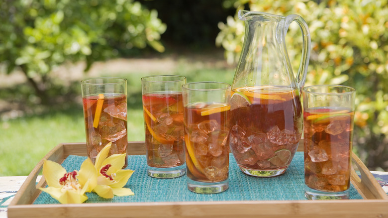 Tray of iced tea and flowers
