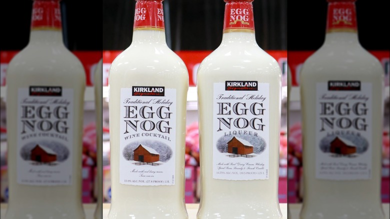 Two bottles of Costco Kirkland Signature traditional holiday eggnog liqueur and wine