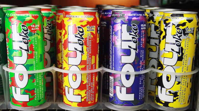 Four different flavors of camo printed Four Loko sit in a beverage refrigerator