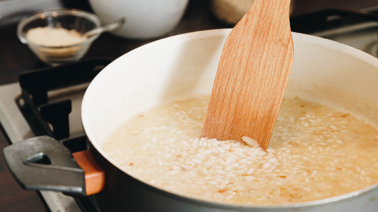 Stirring pot of risotto