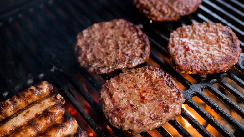 Cooking burgers on a barbecue