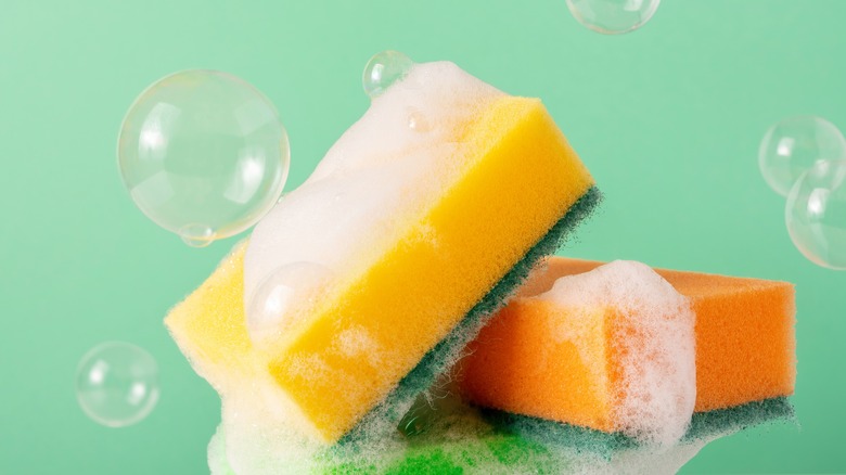Kitchen sponges with soap bubbles