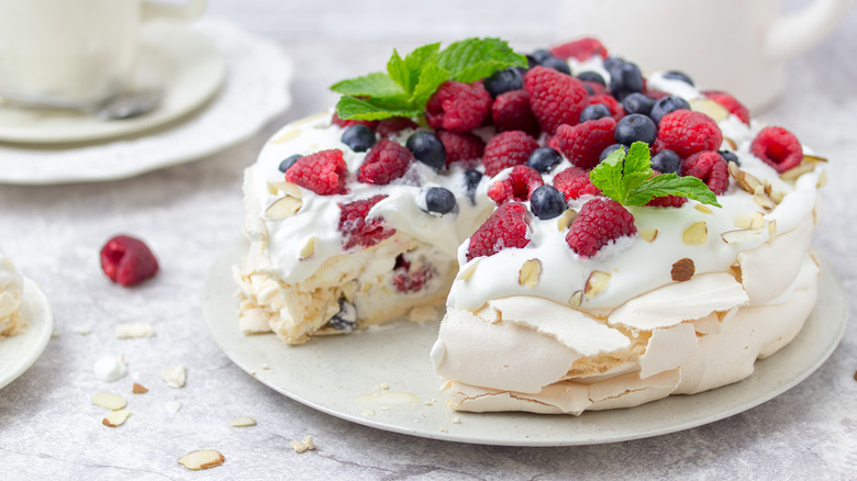 A pavlova with berries