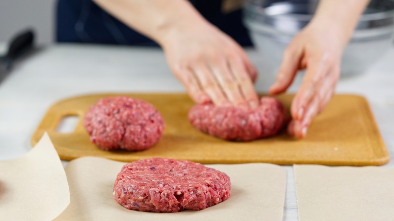 Making burger patties by hand