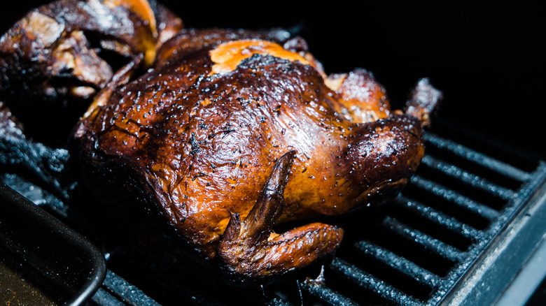 Smoked chicken on grill grates