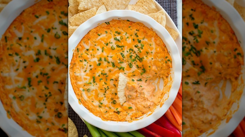 Dish of cottage cheese Buffalo chicken dip with sides