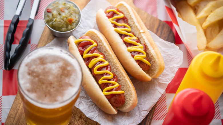Hot dogs with a beer