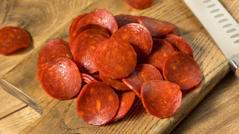 pepperoni on a cutting board