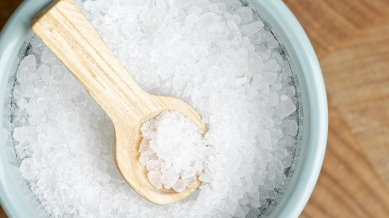 bowl full of coarse salt crystals