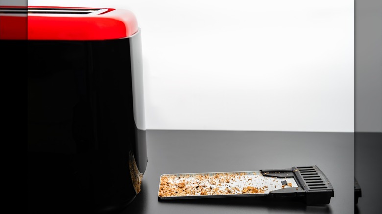 Toaster with crumb tray pulled out 