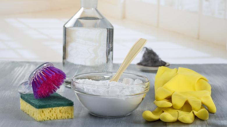 natural cleaning supplies including baking soda and water