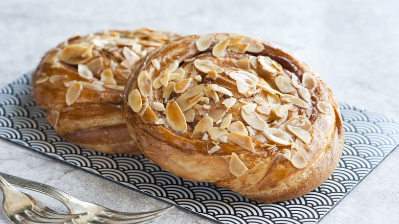 pastry topped with blanched almonds