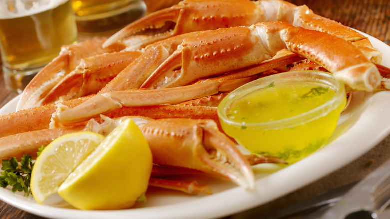 Crab claws and legs with garlic butter and lemon