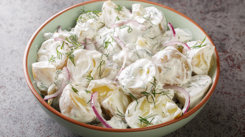 Creamy potato salad in serving bowl