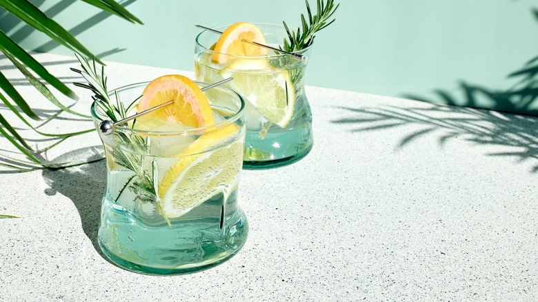 Lemon wheels in cocktail glasses