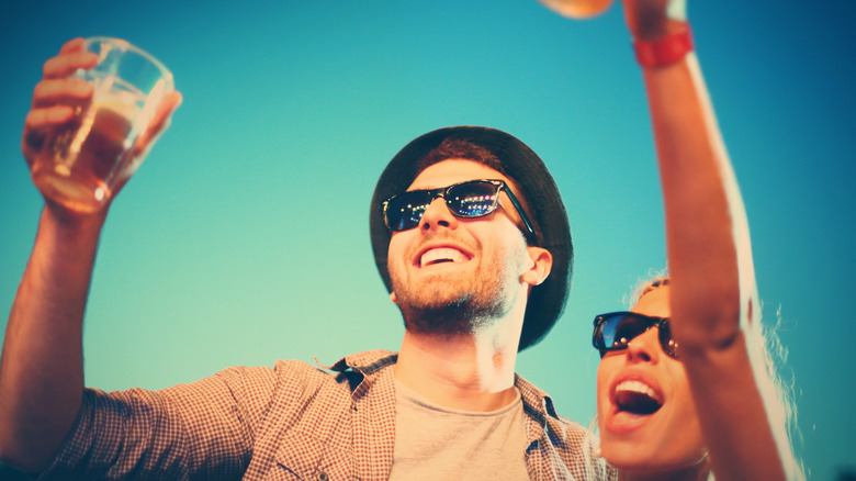 couple drinking beer at beer festival