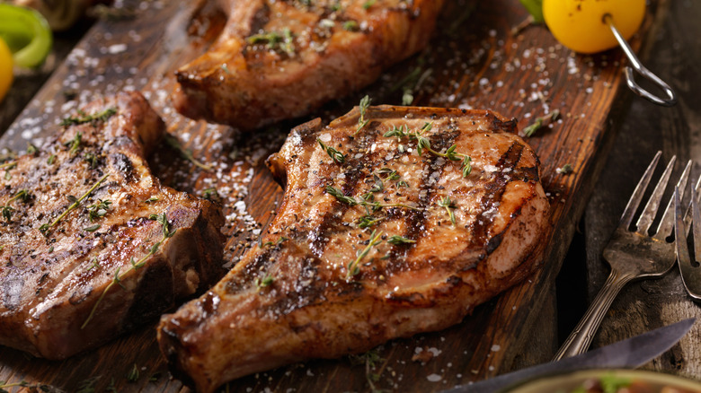Pork chops with crosshatch sear marks from the grill