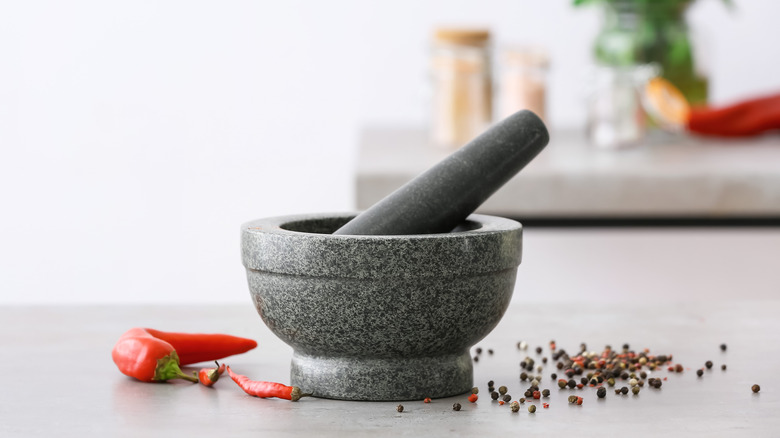 Mortar and pestle for grinding 